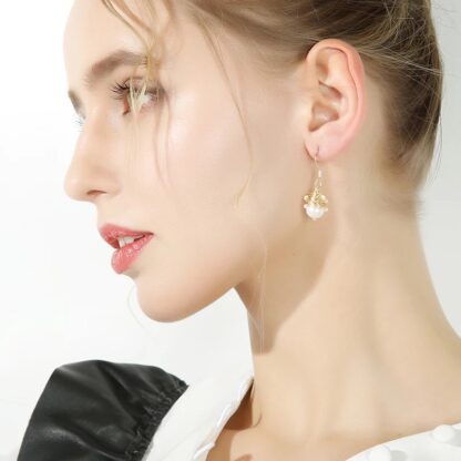 Pearl Dangle Drop Earrings Modeled