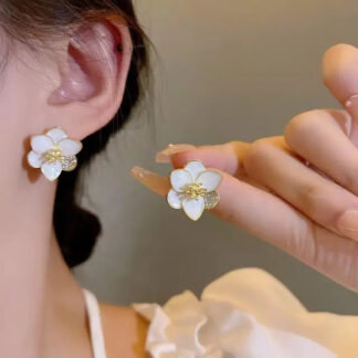 white six petal flower diamond leaf enameled metal earrings